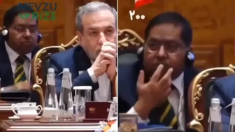 BRICS Zirvesi'nde canlı yayına damga vuran anlar! Pezeşkiyan kürsüde konuşurken yaptığı hareket olay oldu: Önünden çekip aldılar