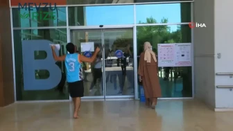Antalya'da KPSS Stresi: Sınavı Sona Bir Dakika Kala Kaçıran Genç Rahat Tavırlarıyla Dikkatleri Üzerine Çekti!