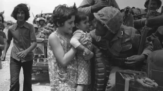 Kıbrıs’ta 52 yıl sonra kimlikleri belirlenen şehitler toprağa verildi
