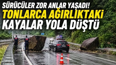 Sürücüler zor anlar yaşadı! Tonlarca ağırlıktaki kayalar yola düştü