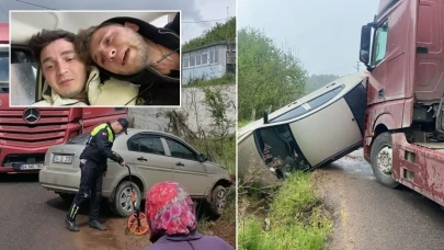 Kazada yan yatan otomobilde mahsur kalan 2 arkadaş o anları görüntüledi
