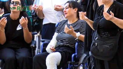 Korkunç Saldırıda Hayatta Kalan Anne, Eşi ve Oğlunu Tekerlekli Sandalyeyle Uğurladı!